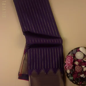 Dark Purple Temple Border Semi Kanchipuram Silk with Zari Stripes on the Body and Contrast Pink Pallu and Blouse