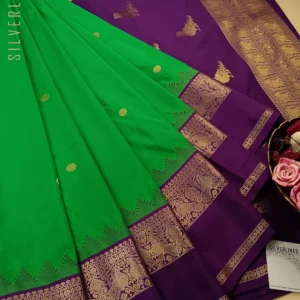 With Captivating Colors and Designer Pallu this Semi Kanchipuram Silk in Parrot Green and Purple Stands Out